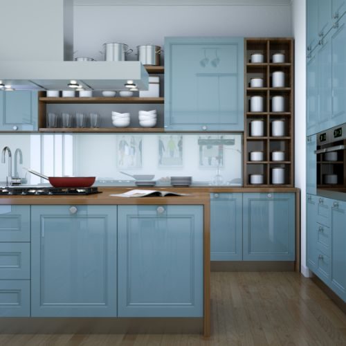 A custom kitchen design for an Auburn home with blue shaker cabinets, a timber benchtop and open shelving unit by 10X Joinery.