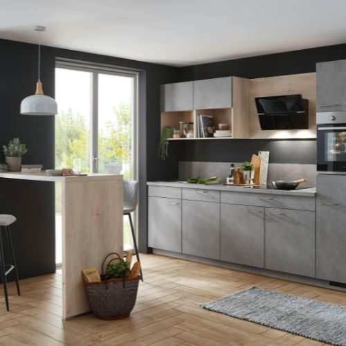 A grey concrete-look kitchen with a timber-finish island benchtop in a Castle Hill home by 10X Joinery.