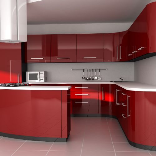 A compact red high-gloss kitchen with full-height cabinetry and curved corner storage, suited to Castle Hill townhouses and apartments by 10X Joinery.