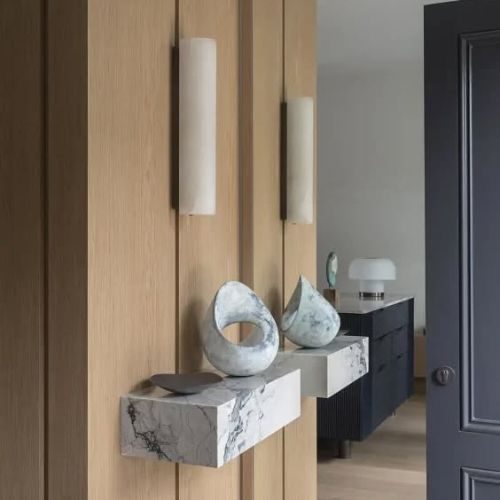 Timber veneer wall panelling with floating marble shelf in a Sydney duplex by 10X Joinery