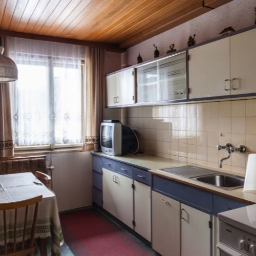 A small, separate kitchen in an older post-war Bankstown home, the kind of closed-off layout 10X Joinery opens up with a custom kitchen renovation.