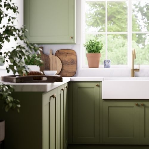 Olive green shaker cabinets with a farmhouse sink and brass tapware, made direct from our workshop for a Baulkham Hills kitchen by 10X Joinery.
