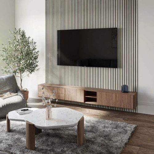 A full-height timber batten media wall with a wall-mounted TV and low timber console in a Sydney living room by 10X Joinery.